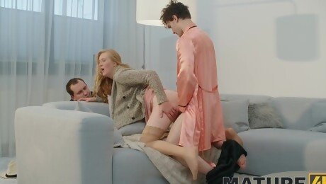 MMF threesome on the sofa with a mature blonde - Angelica